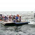 Pulau Payar:<BR />The ferry docked at at an off-shore platform and passengers were taken to the jetty one group at a time on this boat.